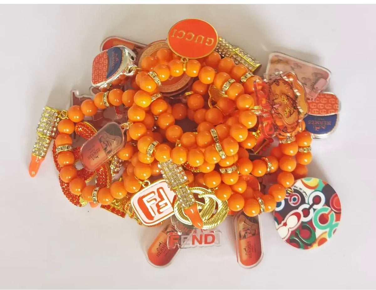 Designer Inspired Three Piece Orange Mix Charm Four Piece Bracelet Set