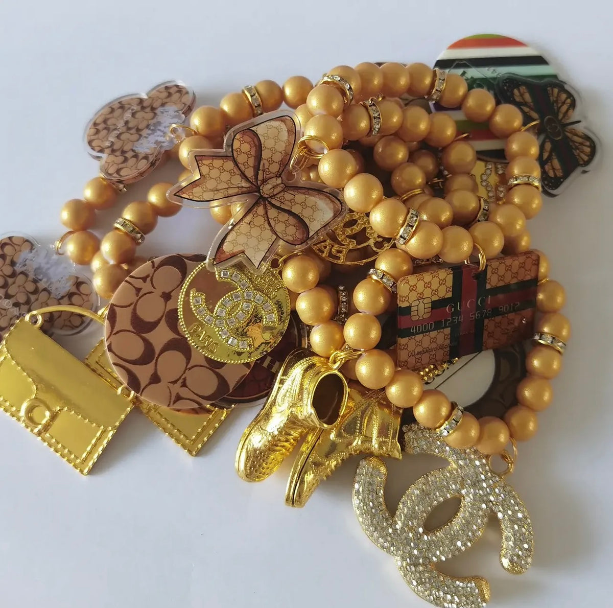 Designer Gold Mix Charm Three Piece Bracelet Set